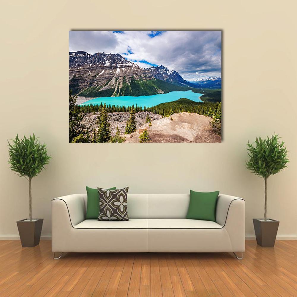 Peyto Lake Under Cloudy Sky Canvas Wall Art in gray, green and blue, single panel hung on a wall