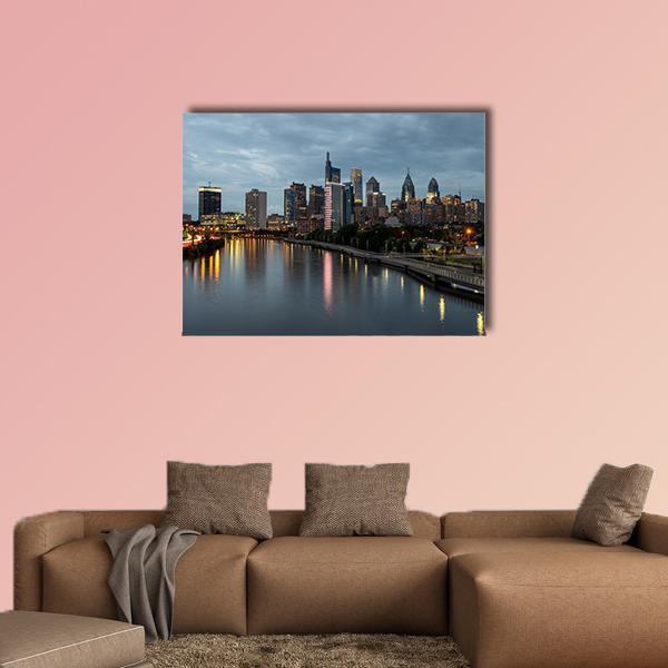 Philadelphia Skyline at Night Canvas Wall Art in black, gray and blue, single panel hung on a wall