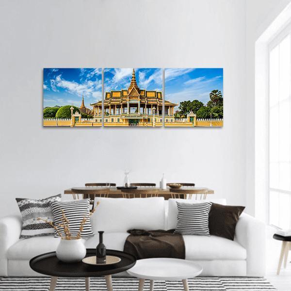 Phnom Penh Royal Palace Complex Panoramic Canvas Wall Art in gold, yellow and blue, hung on a wall