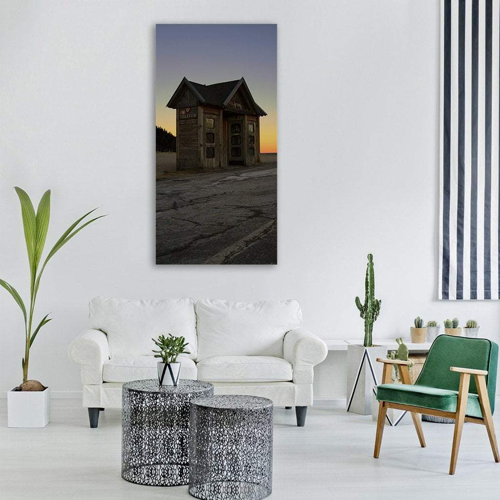 Wooden Phone Booth in Austria at Sunset Vertical Canvas Wall Art in gray, brown and orange, single vertical panel hung on a wall