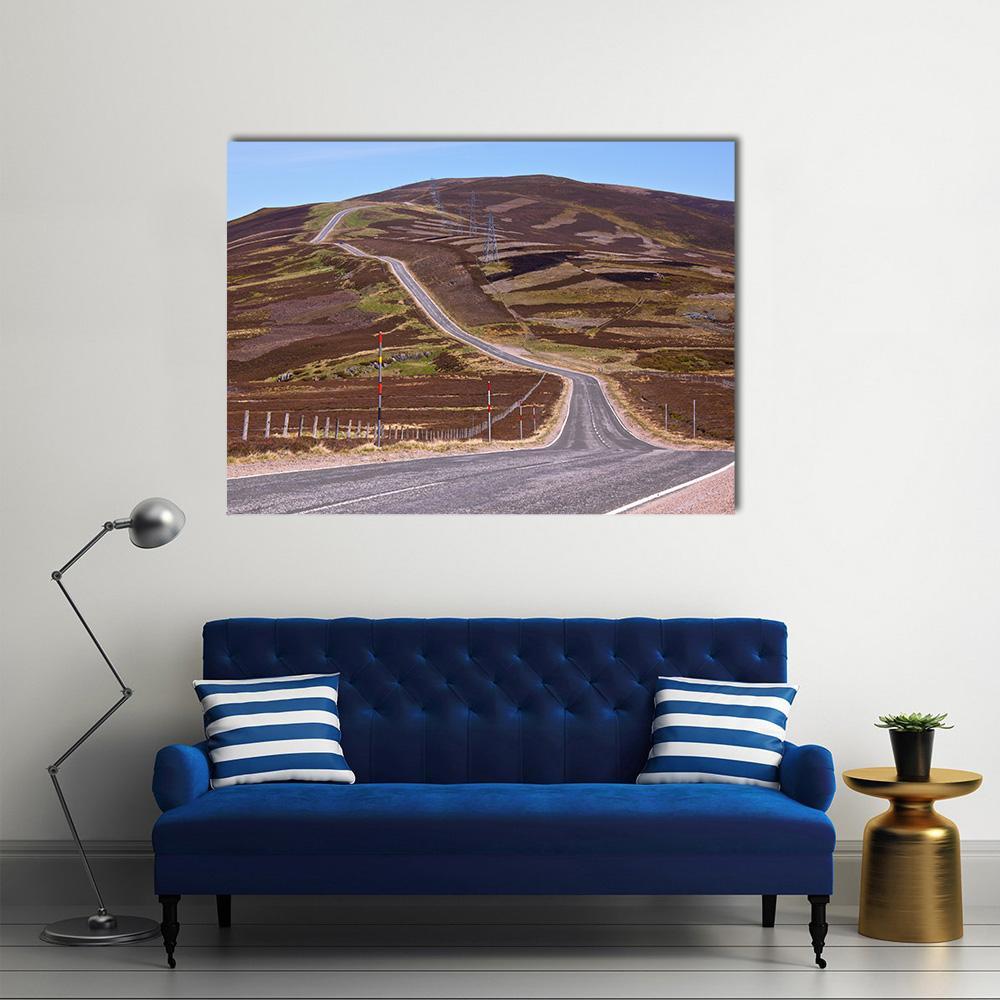 Picturesque Road in Scottish Highlands Canvas Wall Art in gray, brown and blue, single panel hung on a wall