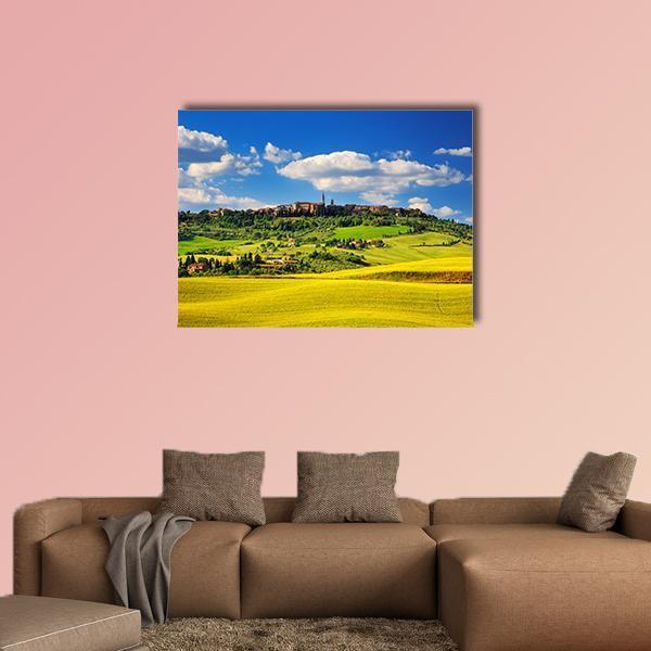 Pienza Medieval Village in Summer Canvas Wall Art in yellow, green and blue, single panel hung on a wall