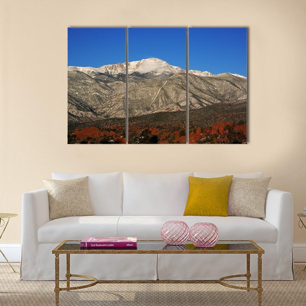 Snow-capped Mountain Over Red Rock Foothills Canvas Wall Art in gray, brown and blue, 3 panel horizontal set hung on a wall