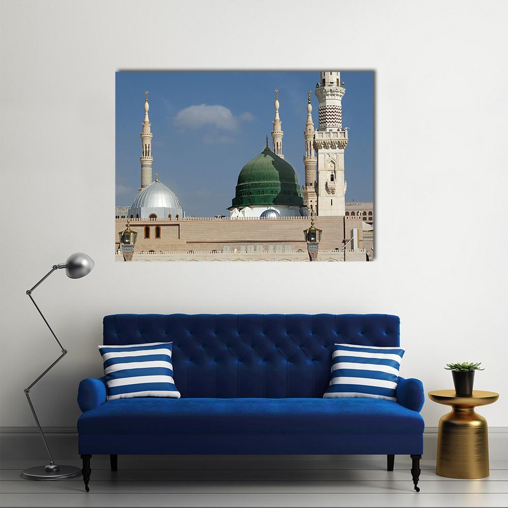 Masjid E Nabawi Canvas Wall Art in beige, green and blue, single panel hung on a wall