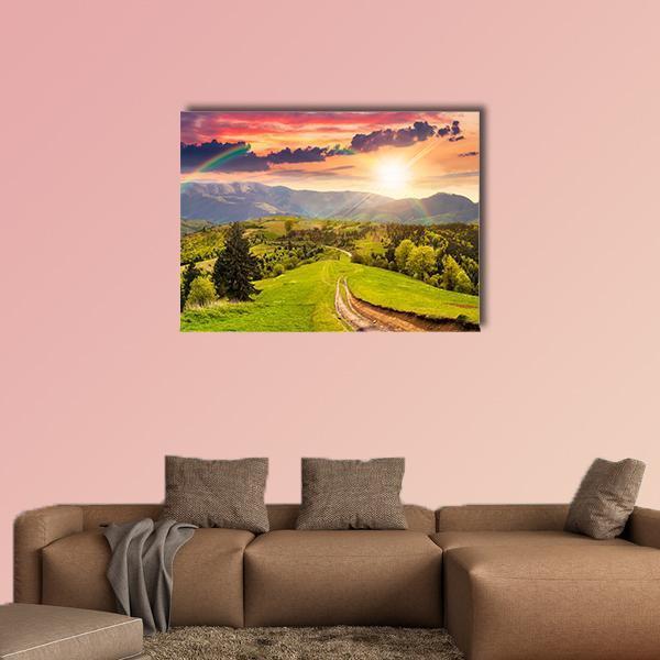 Pine Trees Beside Winding Road at Sunset Canvas Wall Art in orange, yellow and green, single panel hung on a wall