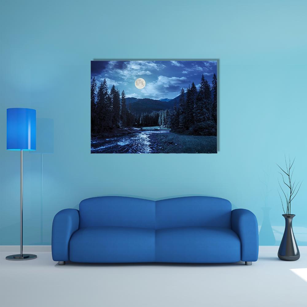 Moonlit Pine Forest and Mountain River Canvas Wall Art in black, blue and navy, single panel hung on a wall