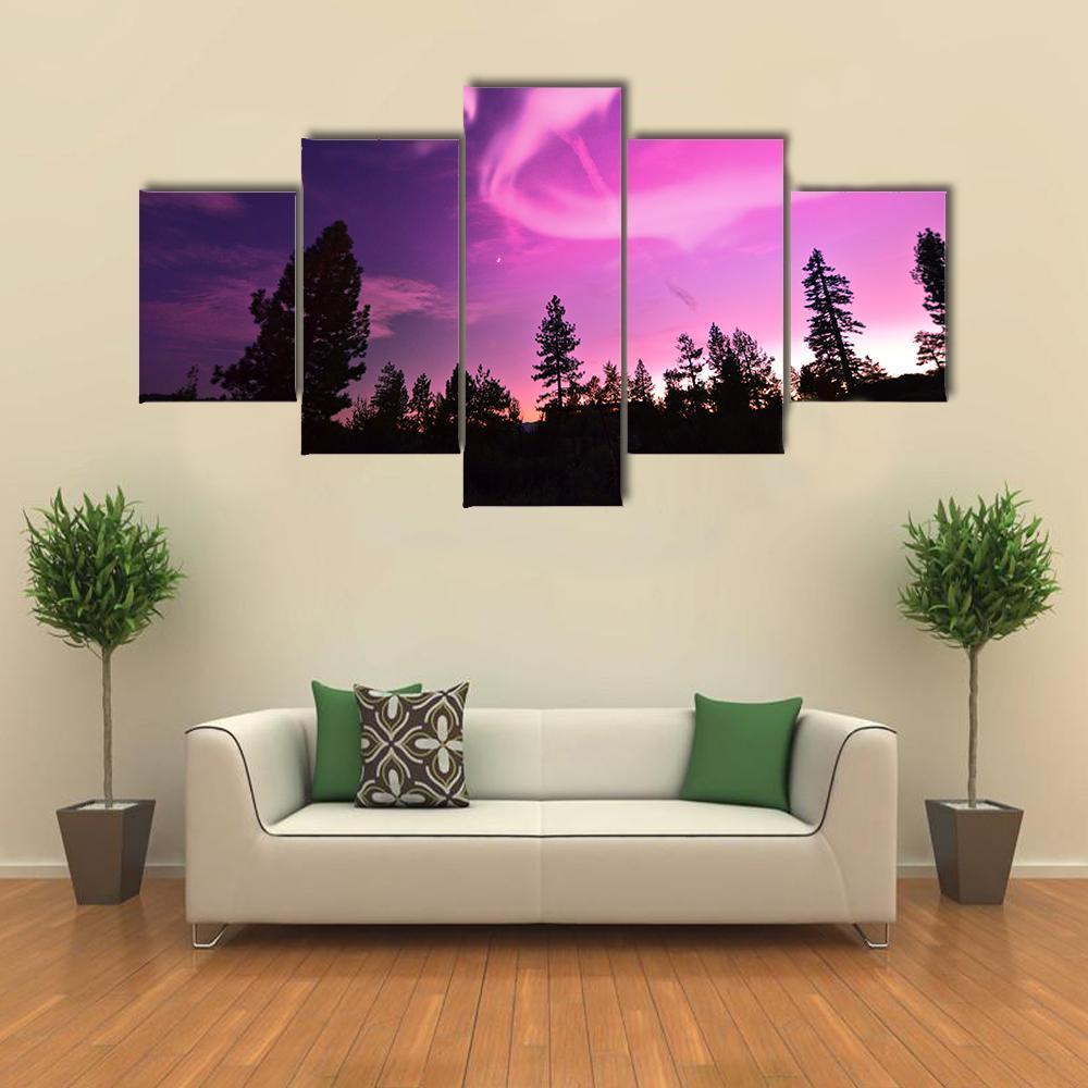 Pink Northern Lights Canvas Wall Art in black, purple and pink, 5 panel Pop layout hung on a wall