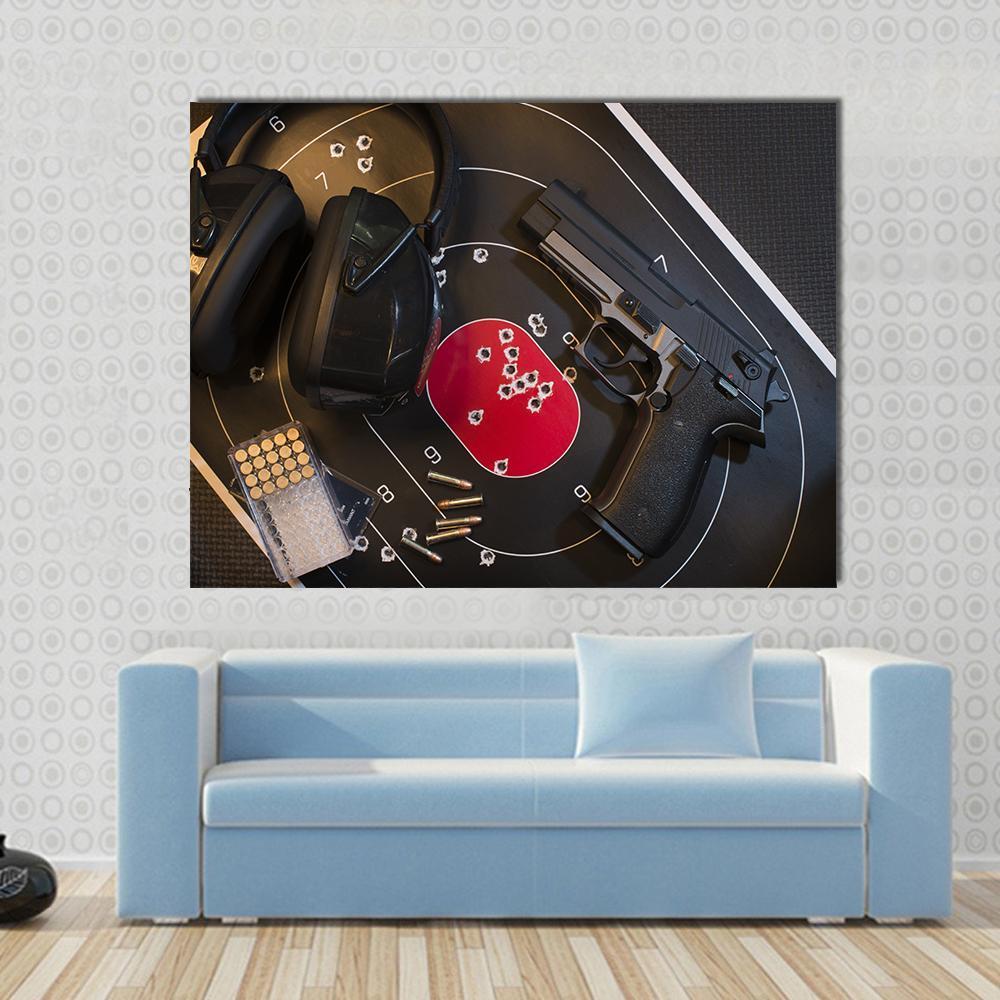 Pistol Target and Ammo Canvas Wall Art in black, white and red, single panel hung on a wall