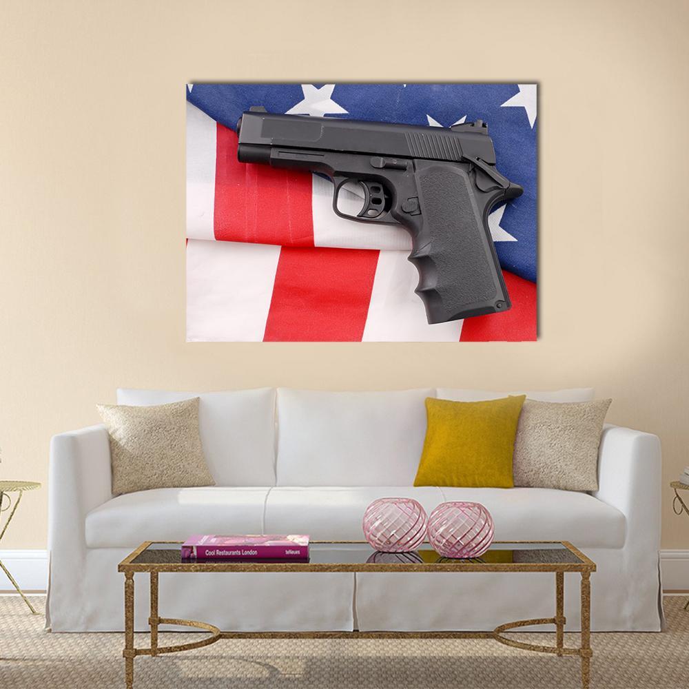 Pistol on American Flag Canvas Wall Art in black, red and blue, single panel hung on a wall