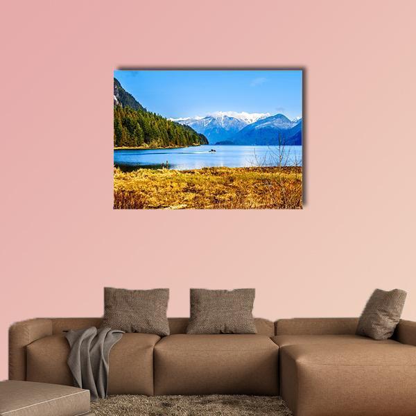 Pitt Lake and Golden Ears Peaks Canvas Wall Art in yellow, green and blue, single panel hung on a wall