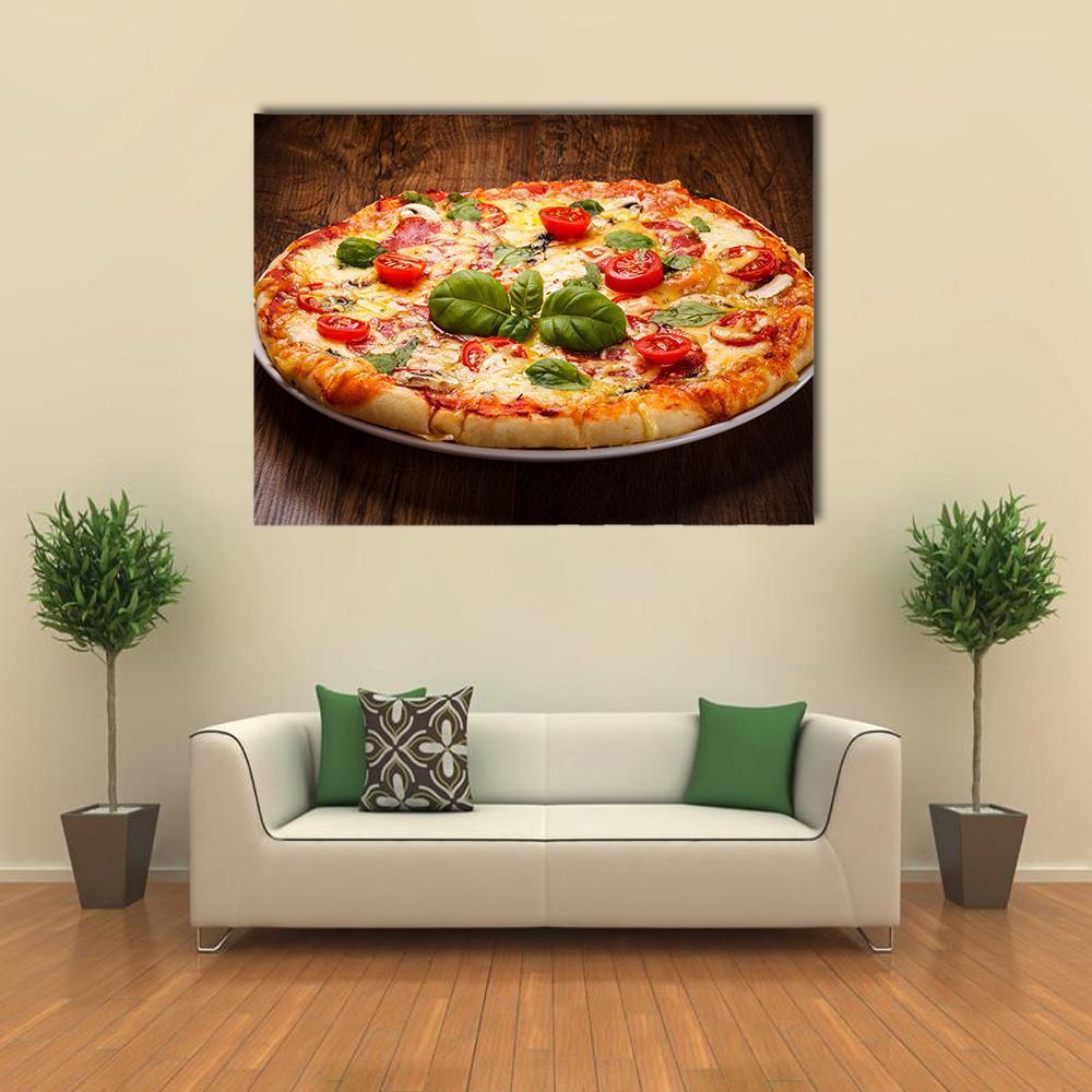 Pizza with Basil and Cherry Tomatoes Canvas Wall Art in brown, red and yellow, single panel hung on a wall