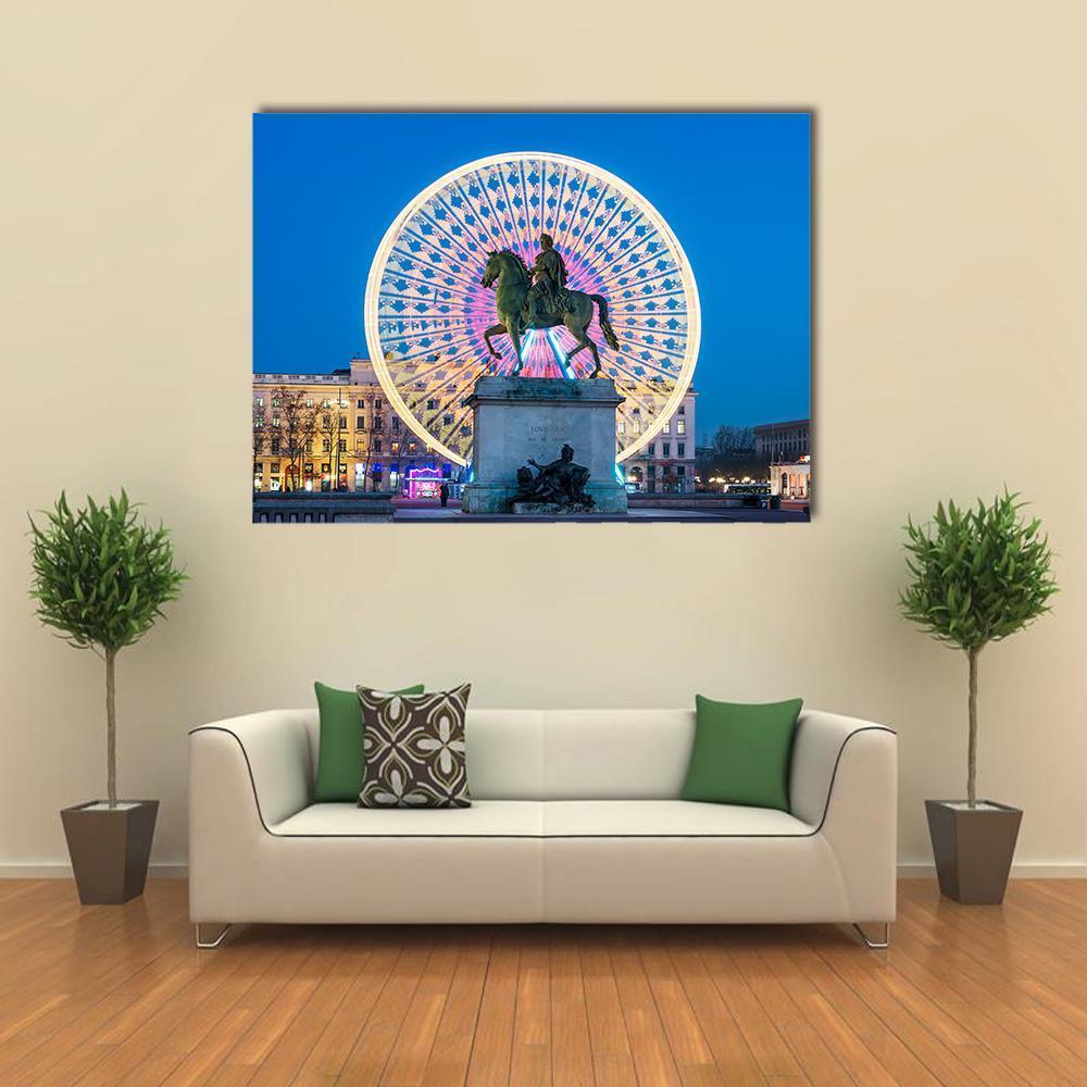 King Louis Statue with Ferris Wheel at Night Canvas Wall Art in white, yellow and blue, single panel hung on a wall