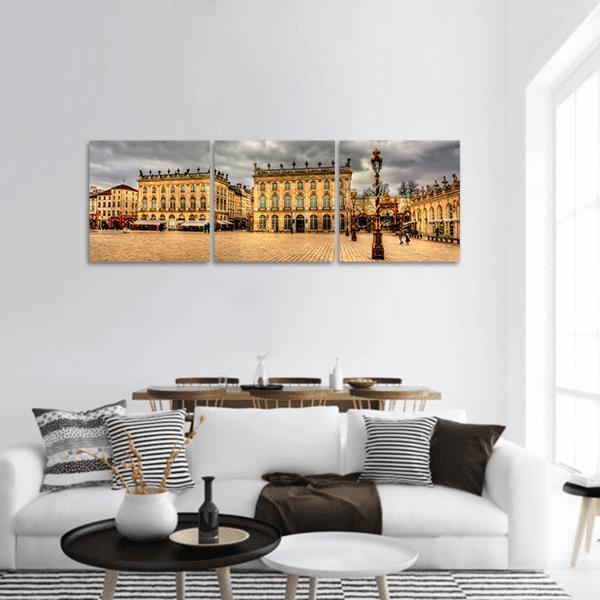 Place Stanislas in Nancy France Panoramic Canvas Wall Art in gray, beige and gold, hung on a wall