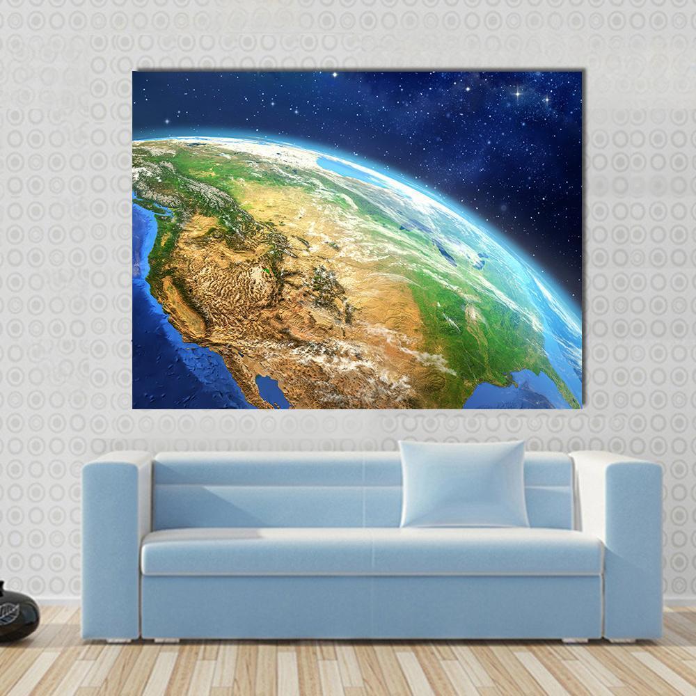 Earth from Space Illustration Canvas Wall Art in brown, green and blue, single panel hung on a wall
