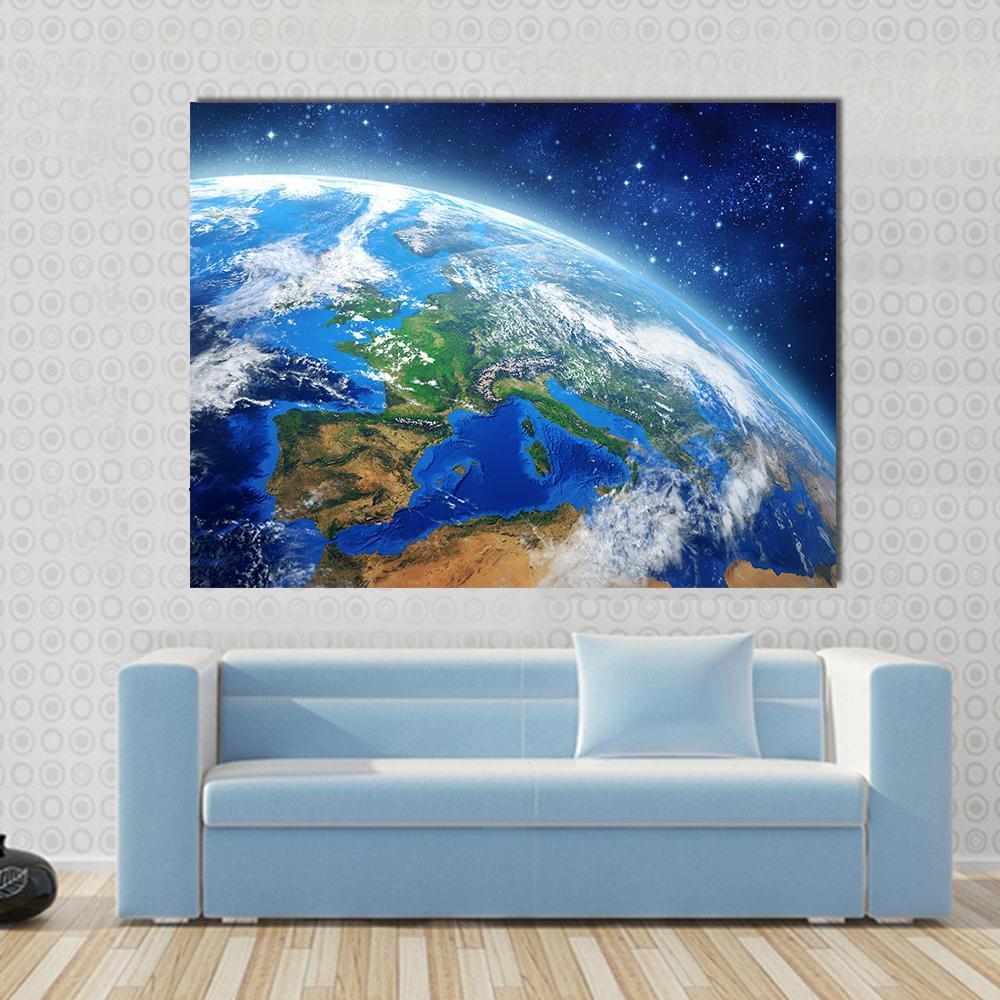 Planet Earth from Low Orbit Canvas Wall Art in white, blue and navy, single panel hung on a wall