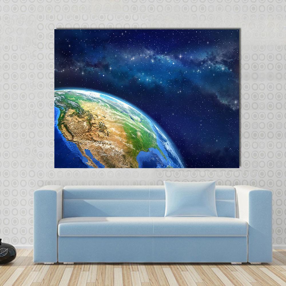 Earth from Space Canvas Wall Art in brown, blue and navy, single panel hung on a wall