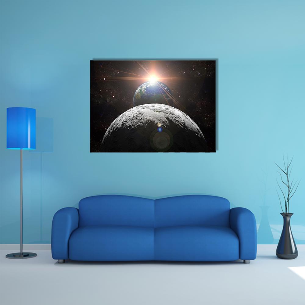 Earth, Moon, and Rising Sun Canvas Wall Art in black and gray, single panel hung on a wall