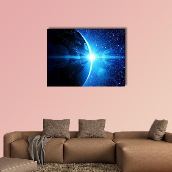 Planet Earth with Sunrise in Space Canvas Wall Art in black and blue, single panel hung on a wall