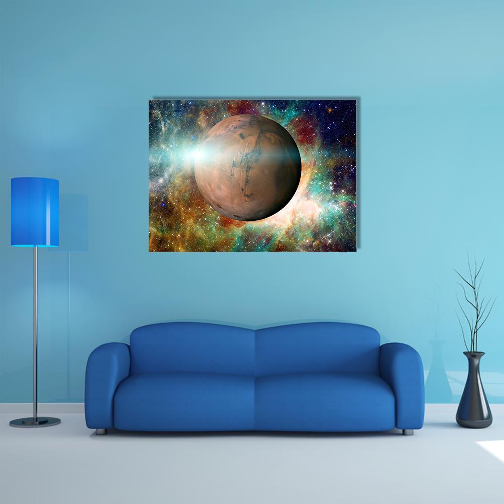 Mars-like Planet with Glowing Nebula Canvas Wall Art in orange, blue and multicolor, single panel hung on a wall