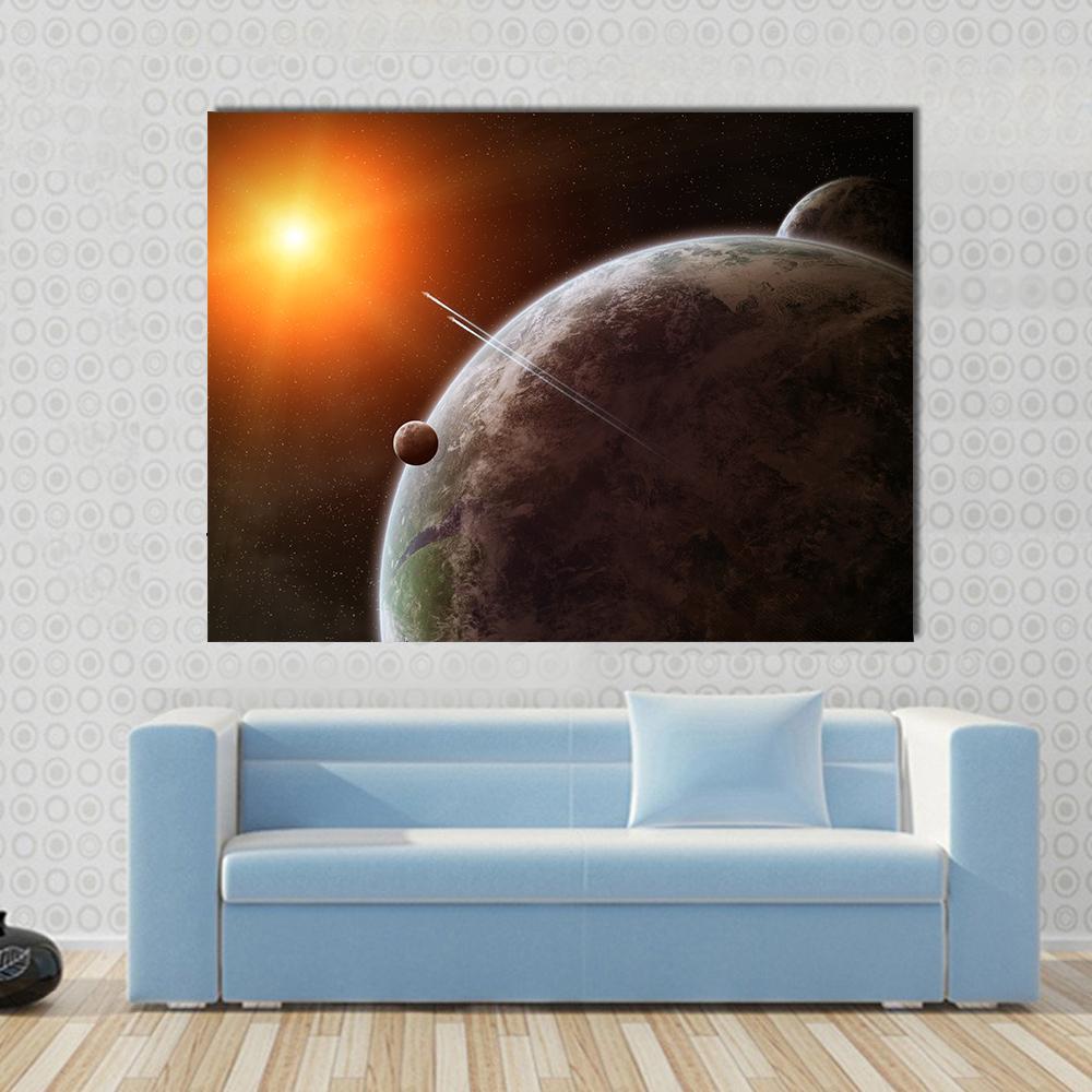 Planet with Moon Orbiting Star Canvas Wall Art in black, gray and orange, single panel hung on a wall