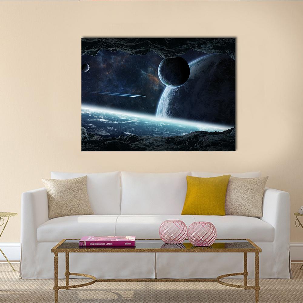 Planets Seen from Cave Canvas Wall Art in black, blue and navy, single panel hung on a wall