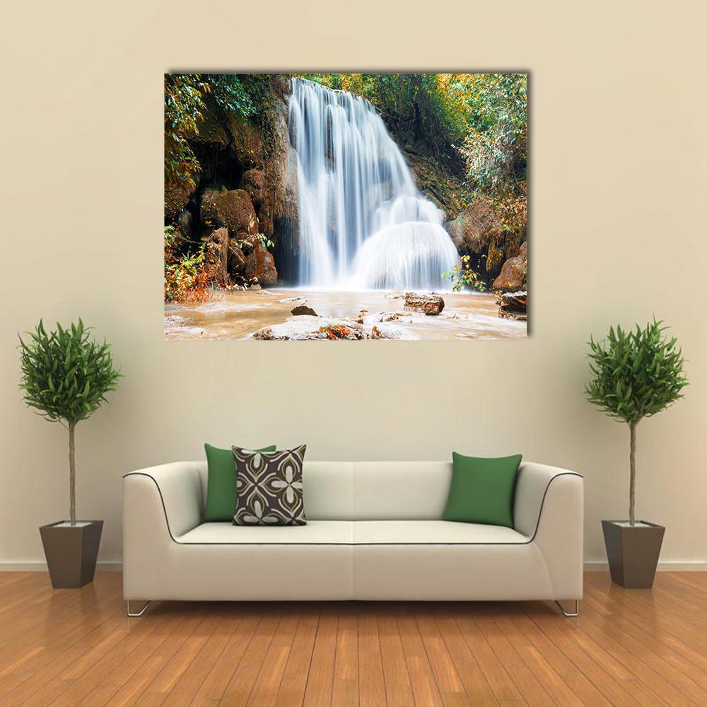 Planthong Waterfall Canvas Wall Art in white, brown and green, single panel hung on a wall