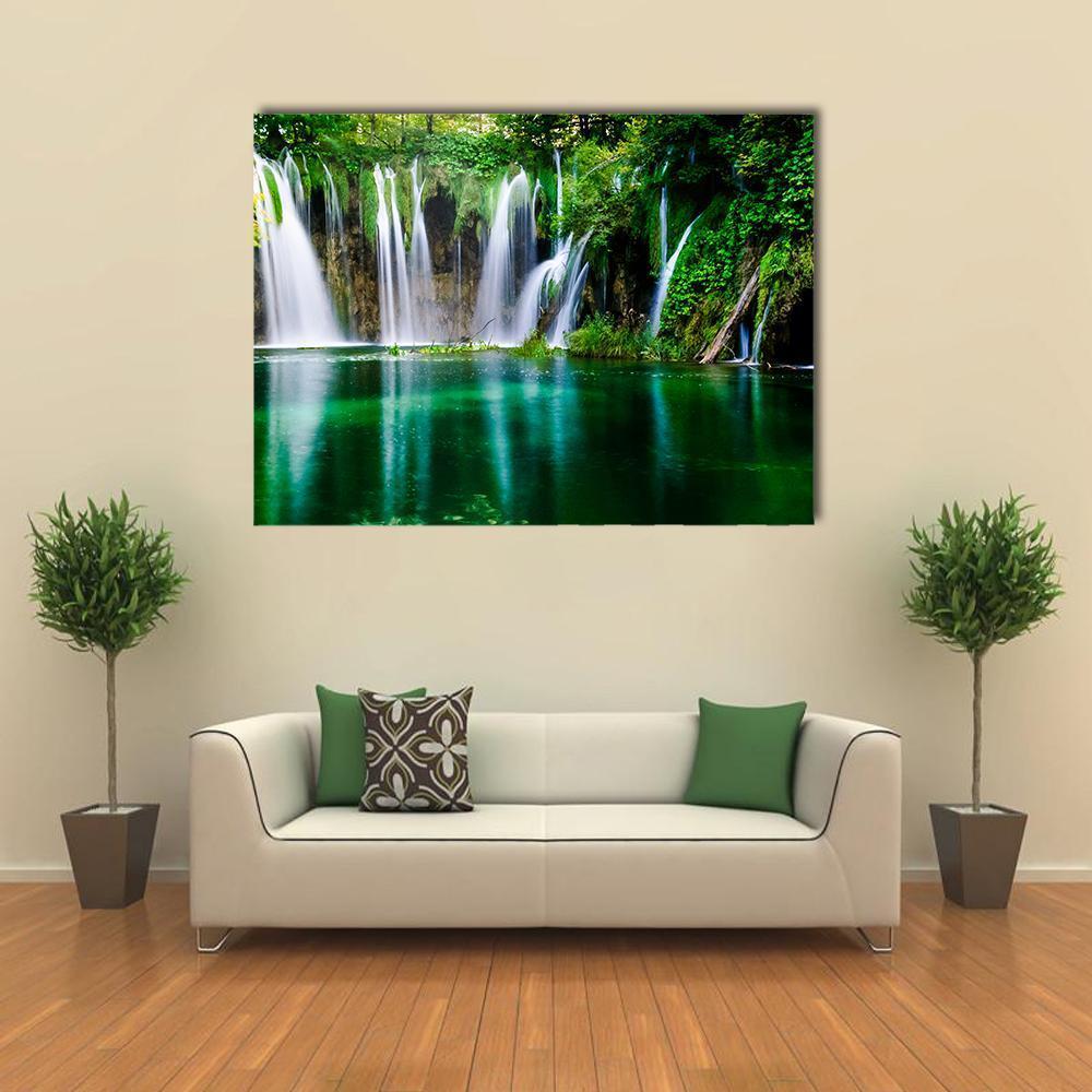 Cascading Waterfalls at Plitvice Lake Canvas Wall Art in black, white and green, single panel hung on a wall