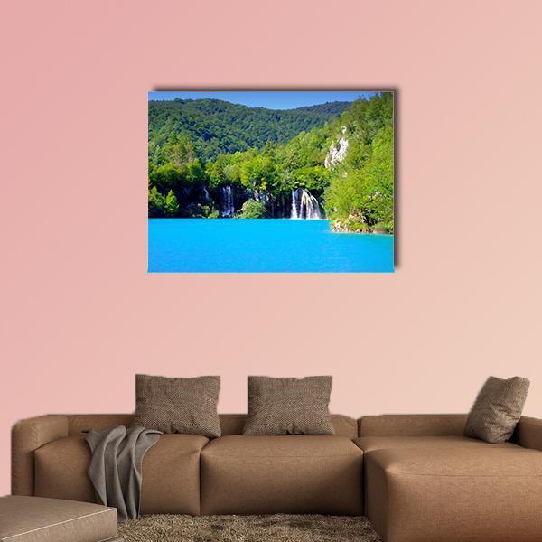 Plitvice Lakes Waterfall and Lake Canvas Wall Art in green and blue, single panel hung on a wall