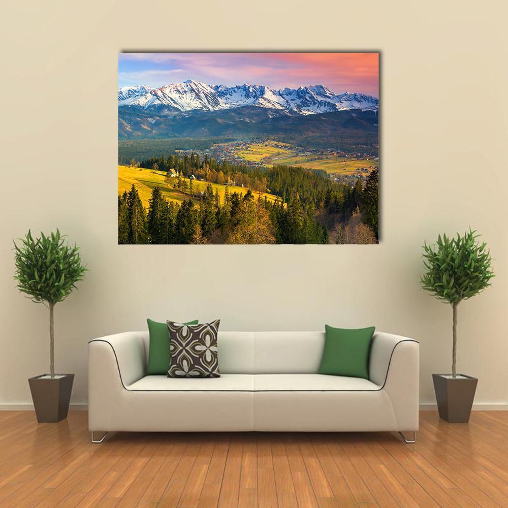 Tatry Mountains at Sunset Canvas Wall Art in orange, green and blue, single panel hung on a wall
