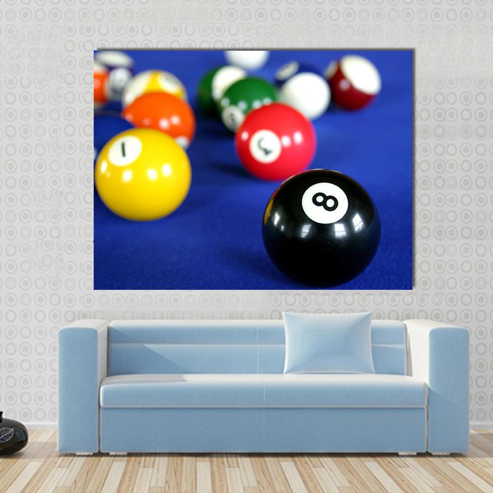 Pool Balls on Blue Table Canvas Wall Art in blue and multicolor, 4 panel Pop layout hung on a wall