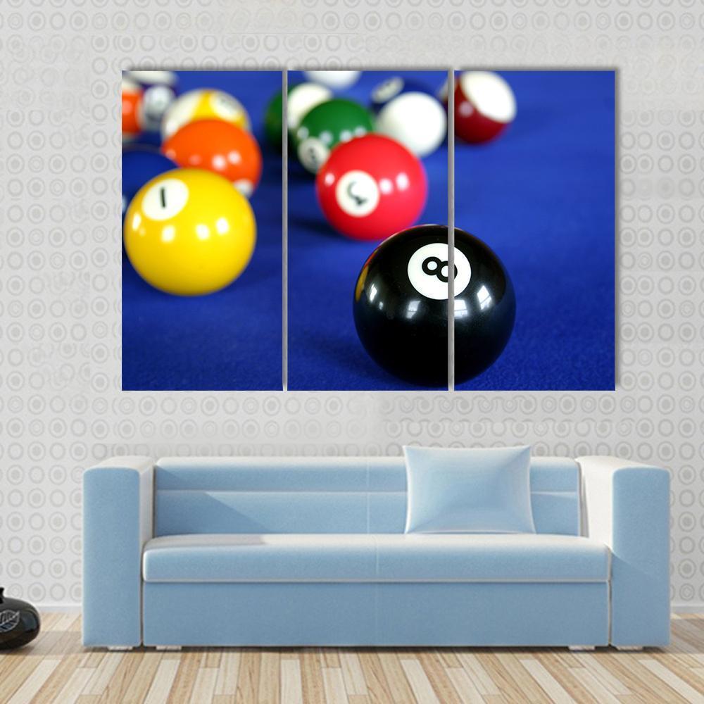 Pool Balls on Blue Table Canvas Wall Art in blue and multicolor, 4 panel Pop layout hung on a wall