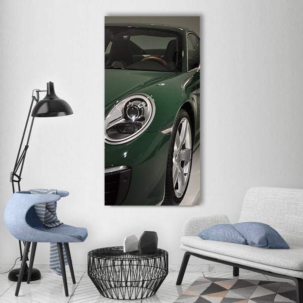 Dark Green Porsche 911 Close-up Vertical Canvas Wall Art in black and green, single vertical panel hung on a wall