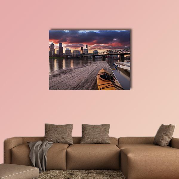 Portland Sunset Over River Skyline Canvas Wall Art in gray, orange and blue, single panel hung on a wall