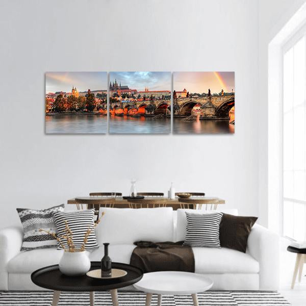 Prague Cityscape at Golden Hour Panoramic Canvas Wall Art in gold, orange and blue, hung on a wall