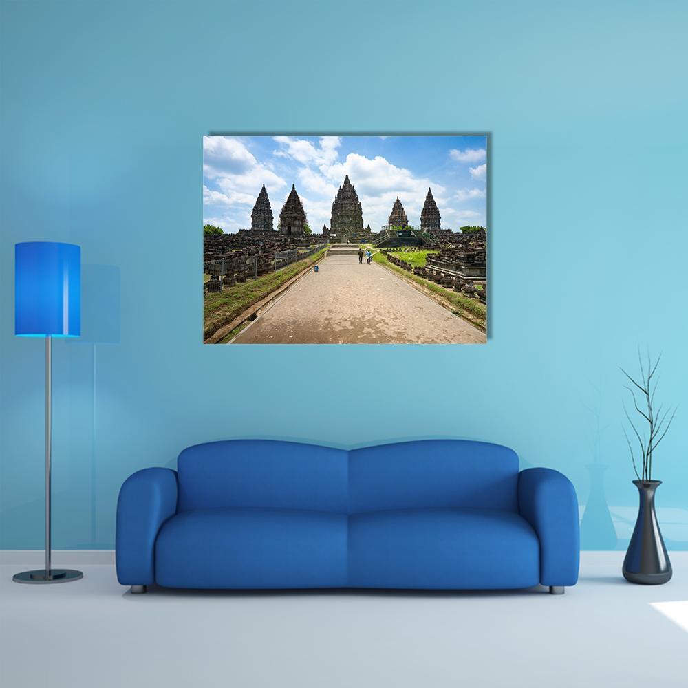 Prambanan Temple Landscape Canvas Wall Art in gray, brown and blue, single panel hung on a wall