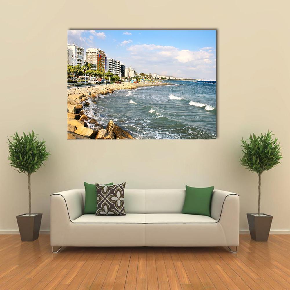 Curved Coastal Shoreline with Palm Trees Canvas Wall Art in white, beige and blue, single panel hung on a wall