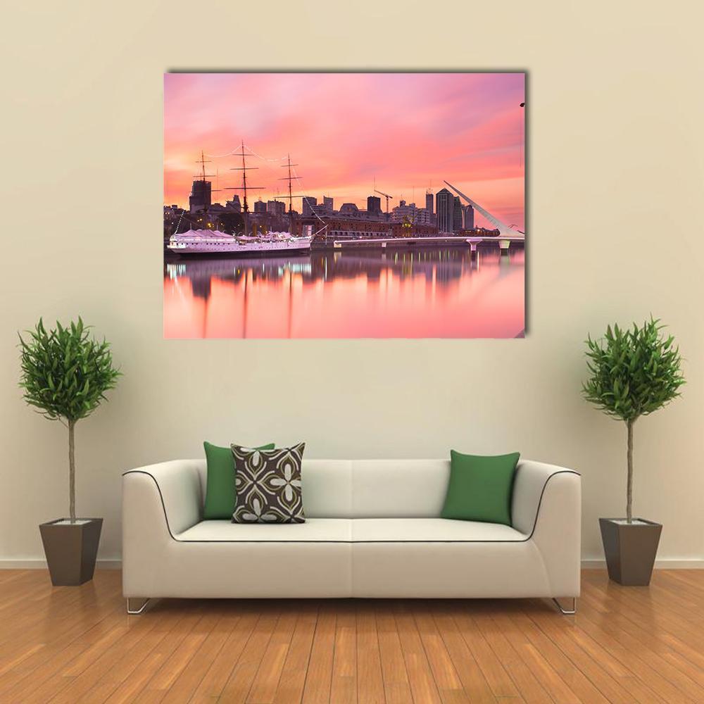 Puerto Madero at Sunset Canvas Wall Art in orange and pink, single panel hung on a wall