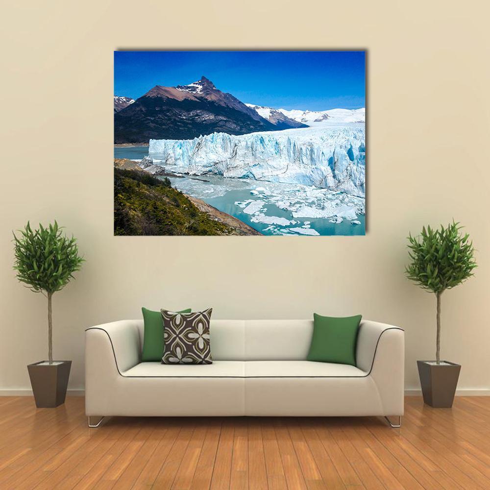 Perito Moreno Glacier Landscape Canvas Wall Art in white and blue, single panel hung on a wall