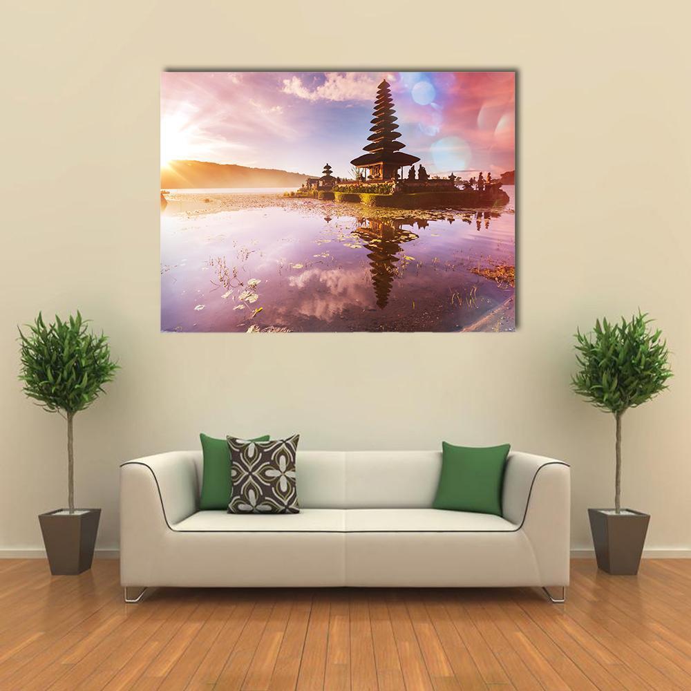 Ulun Danu Temple at Dawn, Bali Canvas Wall Art in orange, purple and pink, single panel hung on a wall