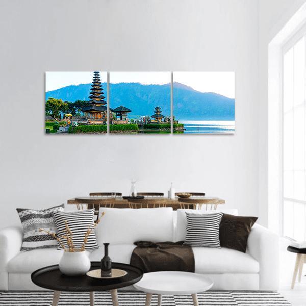 Pura Ulun Danu Temple Panoramic Canvas Wall Art in white, green and blue, hung on a wall