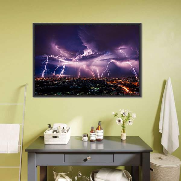 Purple Lightning Strikes Over City Skyline Canvas Wall Art in black and purple, framed canvas, product view on a white background