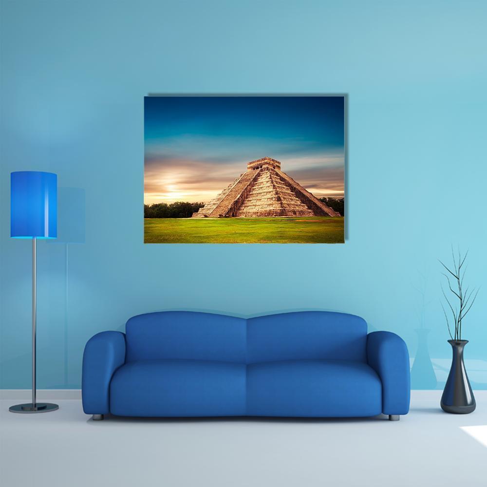 Temple of Kukulkan, Chichen Itza Canvas Wall Art in yellow, green and blue, single panel hung on a wall