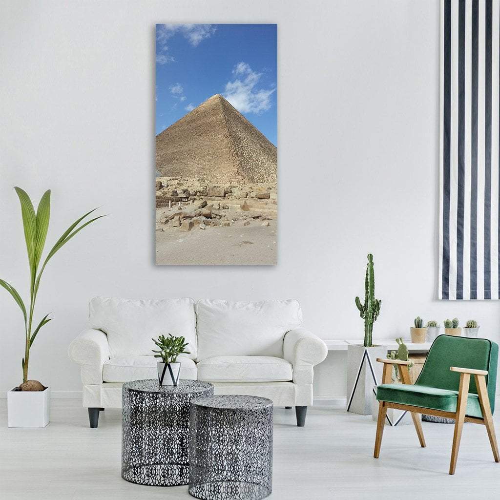 Great Pyramid of Giza, Sunlit Desert Vertical Canvas Wall Art in beige, brown and blue, single vertical panel hung on a wall