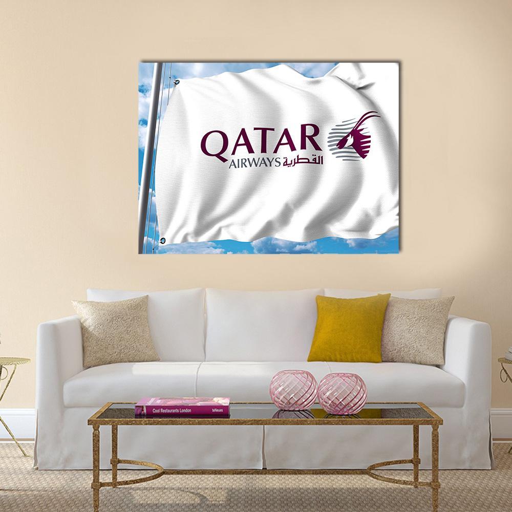 Qatar Airways Flag Against Sky Canvas Wall Art in white, blue and purple, single panel hung on a wall