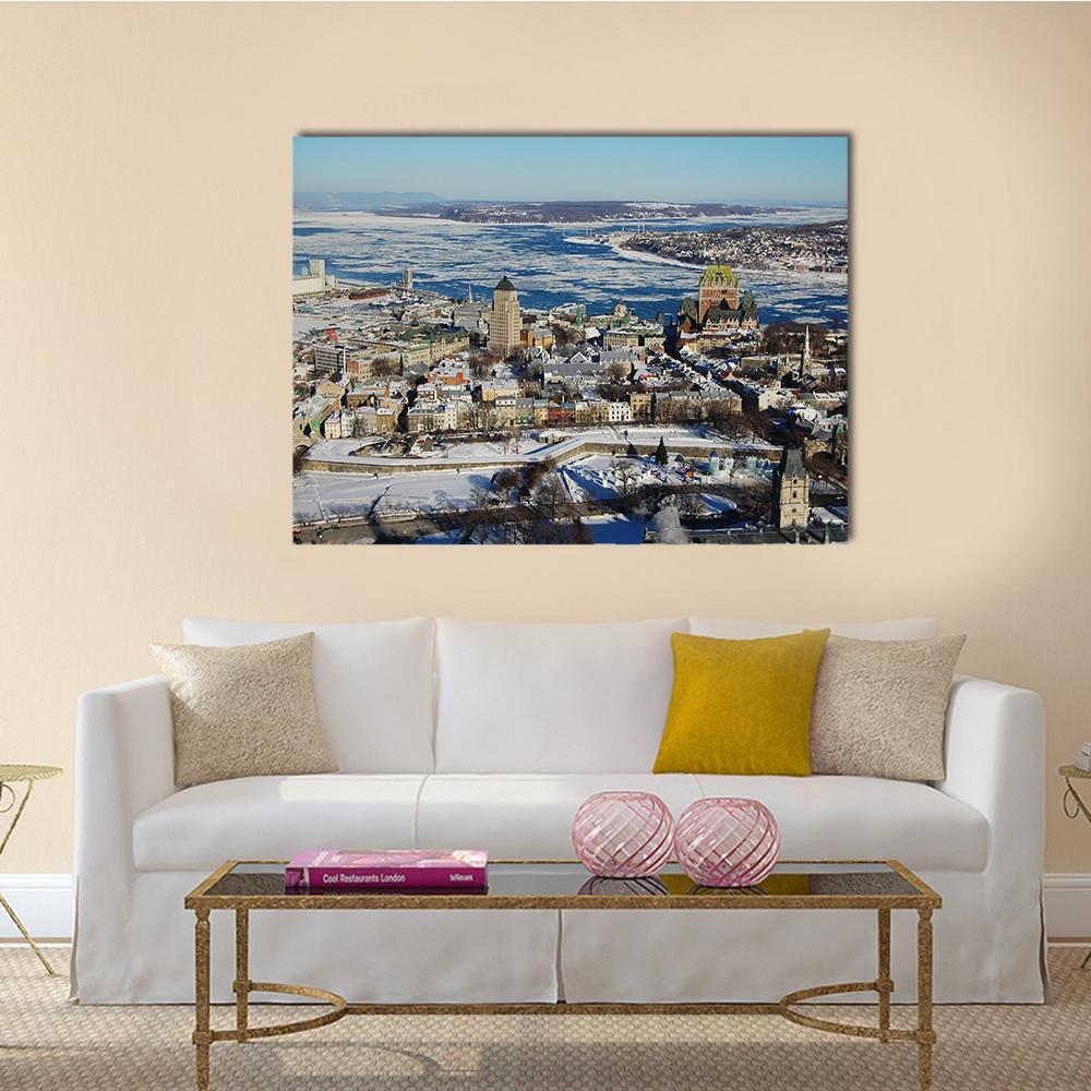 Quebec City in Winter Canvas Wall Art in white, gray and blue, single panel hung on a wall