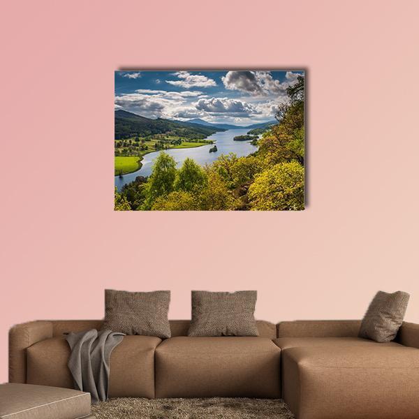 Winding Lake and Treed Hills, Scotland Canvas Wall Art in yellow, green and blue, single panel hung on a wall