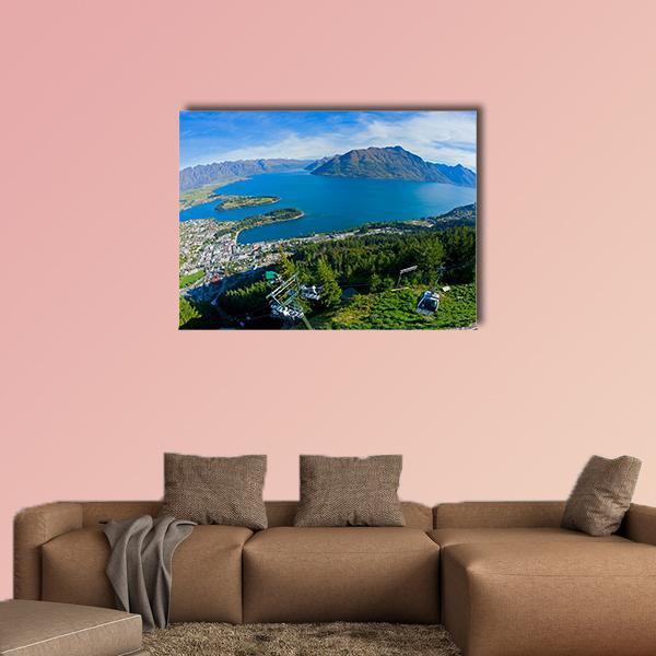 Aerial View of Queenstown and Lake Wakatipu Canvas Wall Art in brown, green and blue, single panel hung on a wall