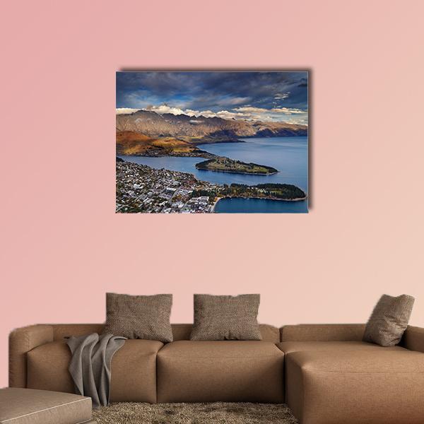 Queenstown Over Lake Wakatipu and Mountains Canvas Wall Art in gray, brown and blue, single panel hung on a wall