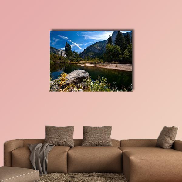 Quiet River in Mountain Valley Canvas Wall Art in brown, green and blue, single panel hung on a wall
