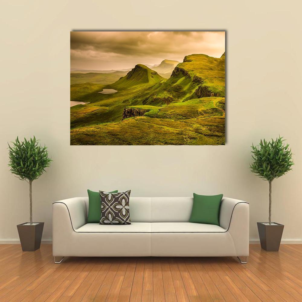 Quiraing Sunset Over Mountains Canvas Wall Art in brown, yellow and green, single panel hung on a wall